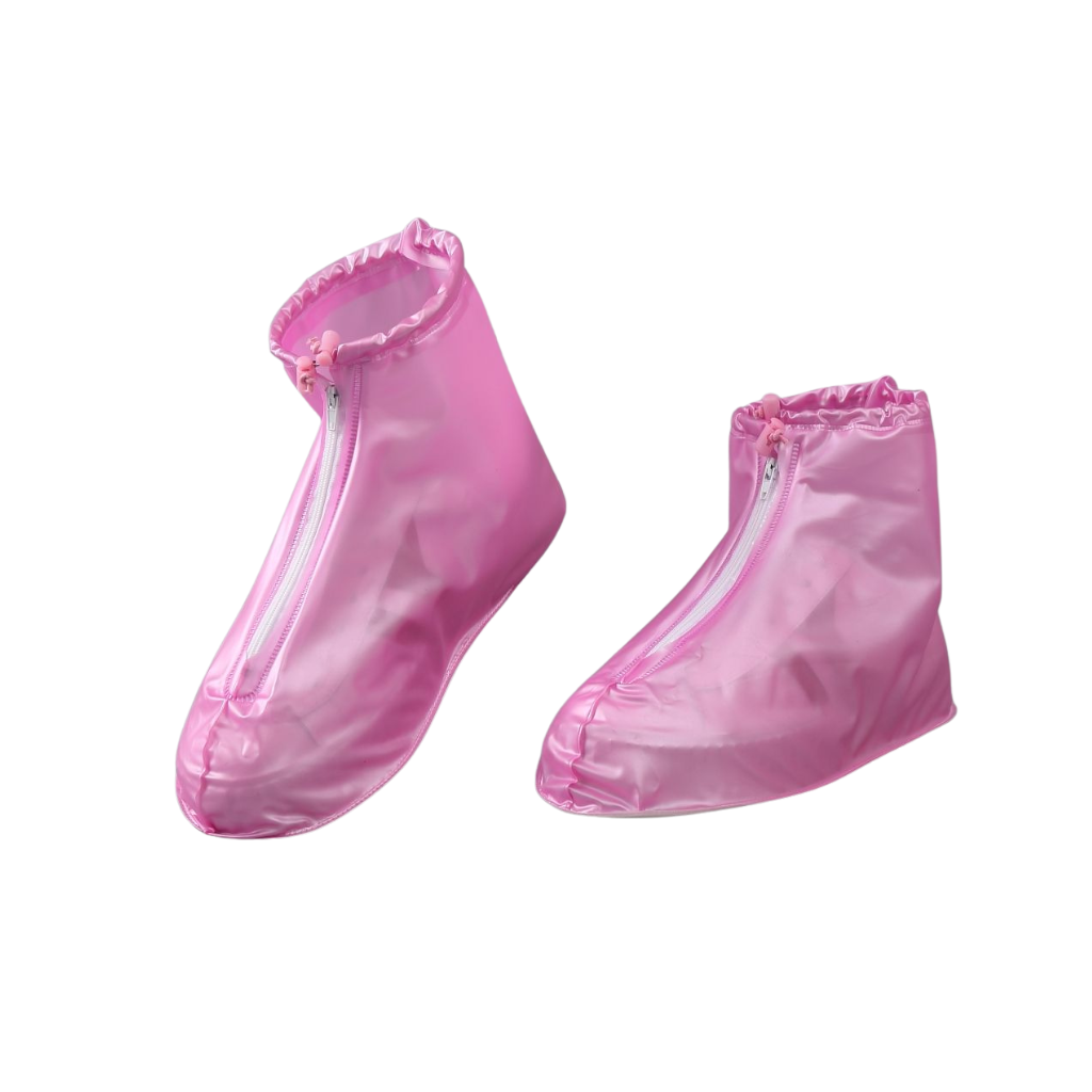 Pink transparent rain boot covers on a white background