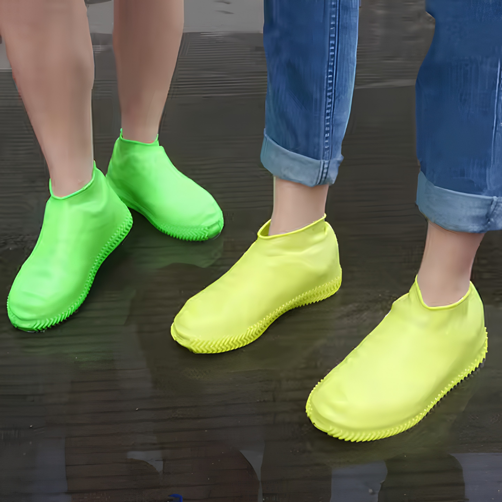 Neon green shoe covers being worn in rain for shoe protection